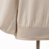 バルーン袖異素材使いニット