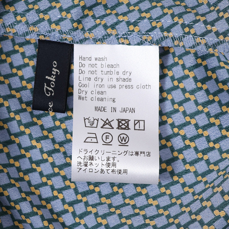 ジオメトリックプリントサイドタイブラウス