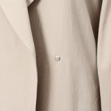 テクノロジートレンチコート